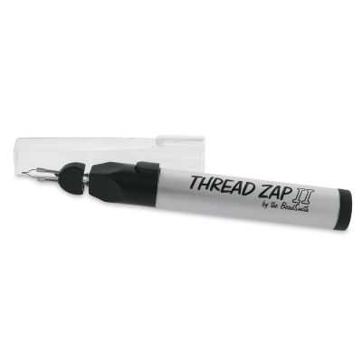 Beadsmith Thread Zap II - Angled view of uncapped Tool with Cap adjacent
