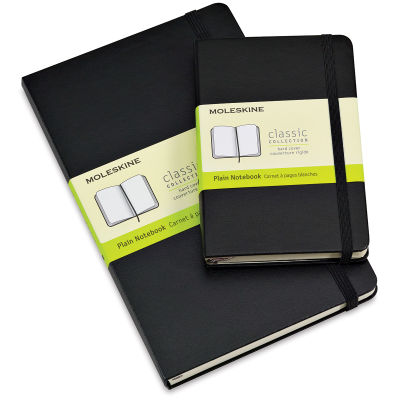 Moleskine Classic Hardcover Notebooks - Top view of 2 sizes of Black Moleskine Notebooks with labels
