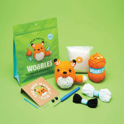 The Woobles Beginner Crochet Amigurumi Kits - Fox (kit contents with finished project and packaging)