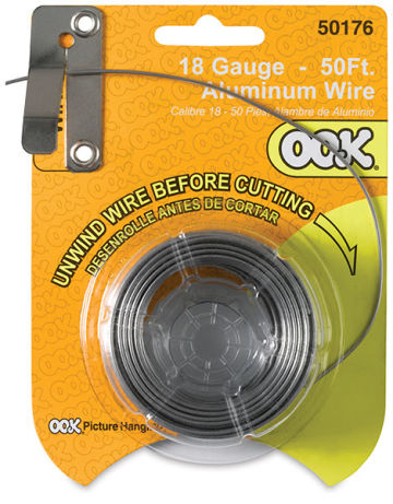 Ook Aluminum Specialty Wire - Front of package shown with wire fed through wire cutter