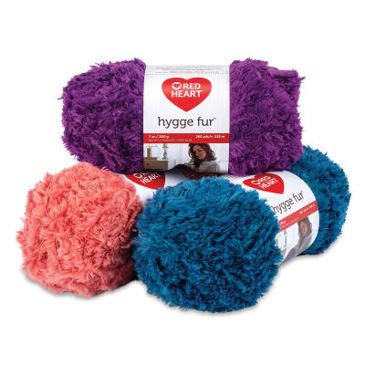 Red Heart Yarn Hygge Fur Yarn - Stack of Three balls of yarn