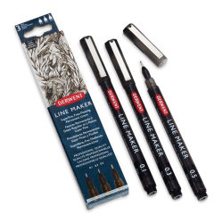 Derwent Line Makers - Components of Black Set of 3 shown next to package, 1 with cap off