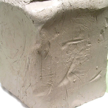 Standard Clay Company 553 Warm Buff Stoneware Clay - Wet clay block shown