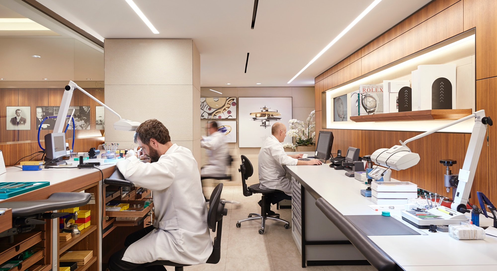Rolex service workshop with watchmakers at their benches
