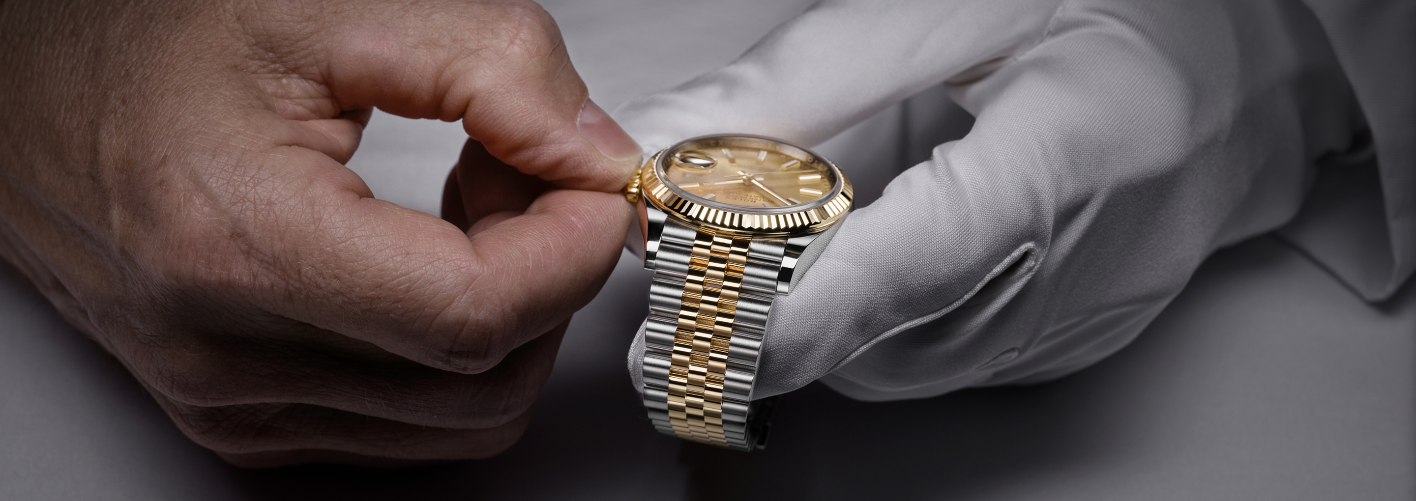 Rolex Datejust being inspected by a watchmaker