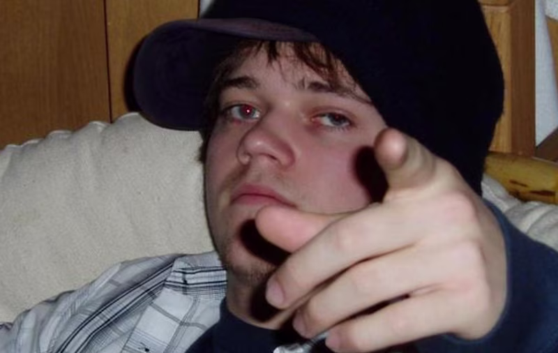 A boy pointing at you.