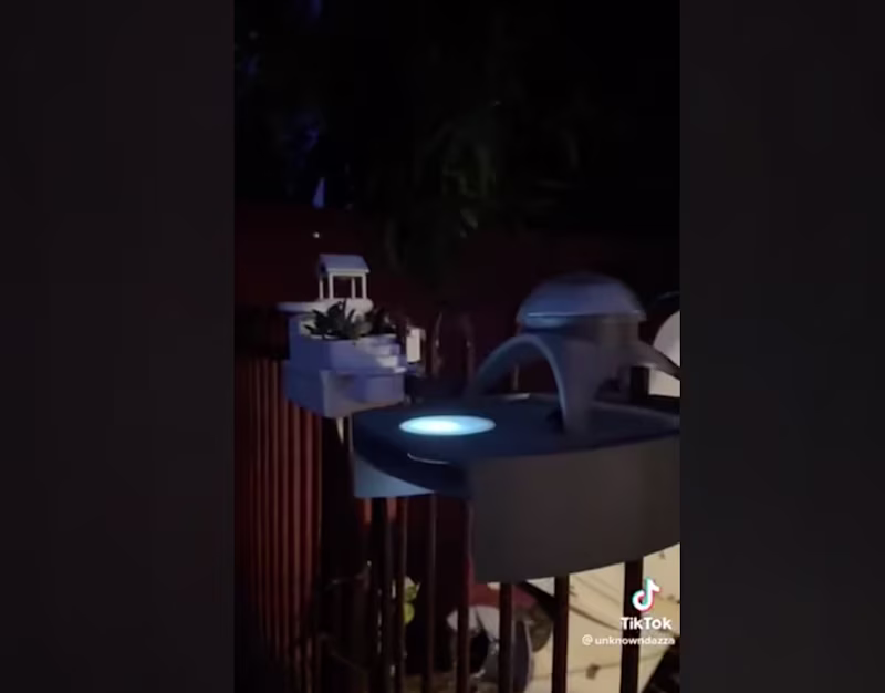 A mansion built on top of a fence