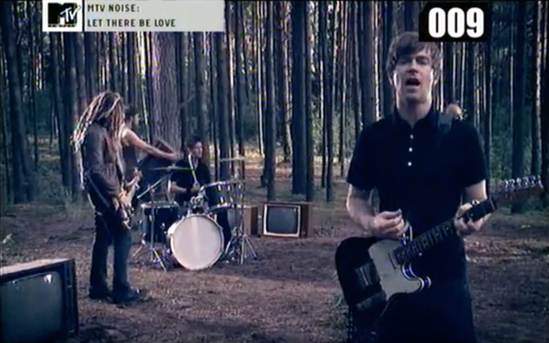 Music video of Nada Surf playing standing in a forrest