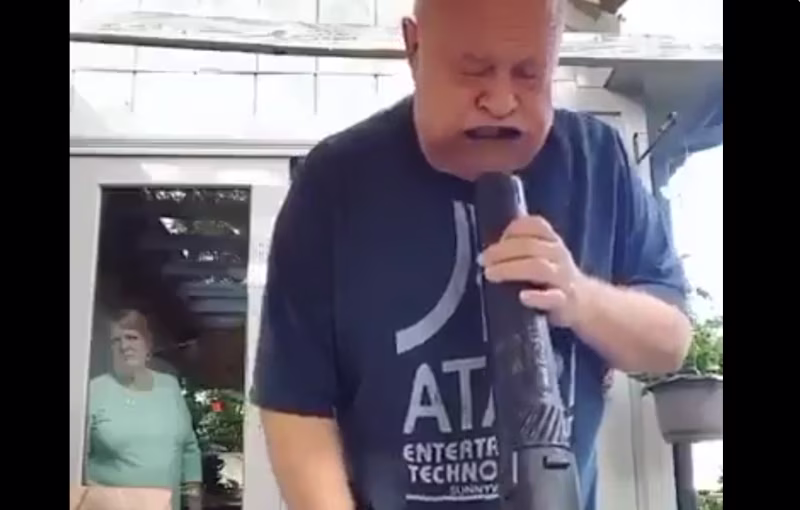 A man pumping air into his mouth