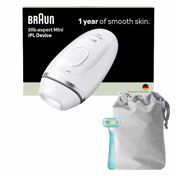 White/Silver Braun Silk·expert Mini with grey pouch and Venus razor with packaging front view behind rendering on white background. White/Silver Braun Silk·expert Mini with grey pouch and Venus razor with packaging front view behind rendering on white background.