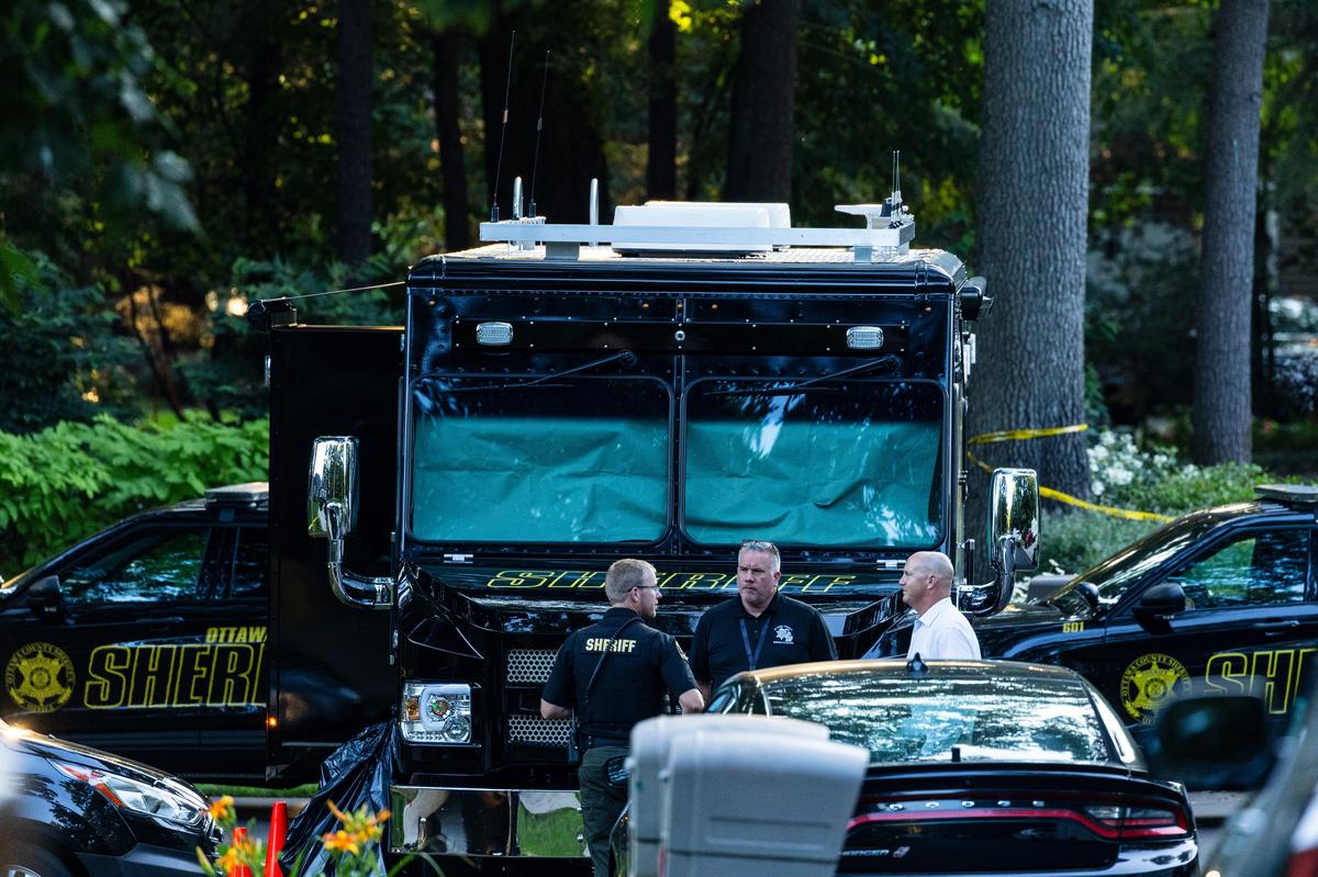 Officials say man killed wife and 6 kids, then himself, before all were found in Michigan home fire