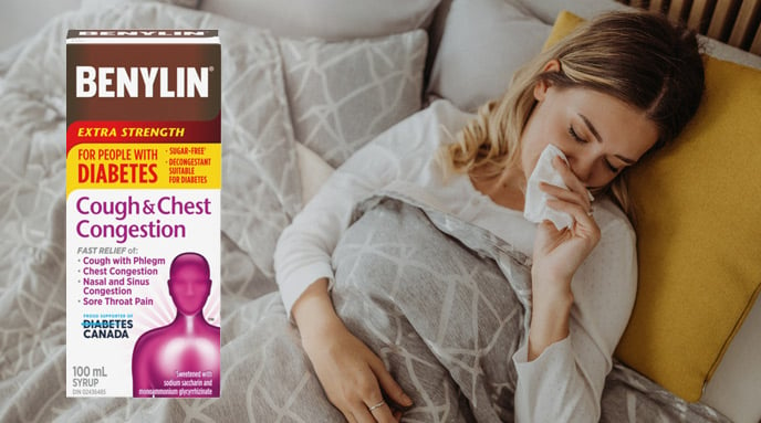 BENYLIN® Extra Strength Cough & Chest Congestion Syrup for People with Diabetes and a woman lying in bed and coughing