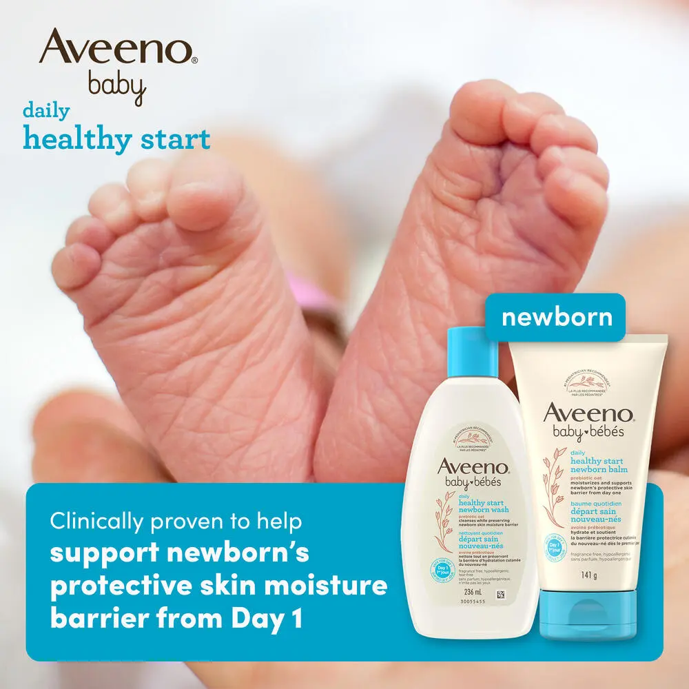 Front shot of Aveeno® Baby Healthy Start Newborn Wash and Balm products and a newborn baby's feet in the background