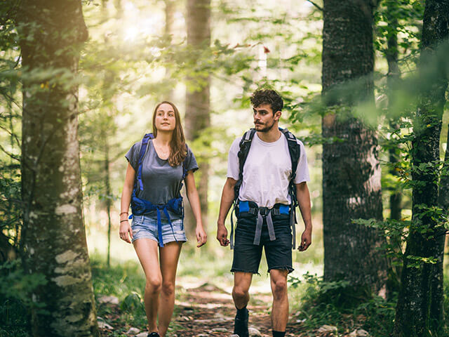 Couple hiking in the woods