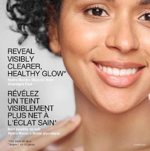 A woman smiling with the text 'reveal visibly clearer, healthy glow'