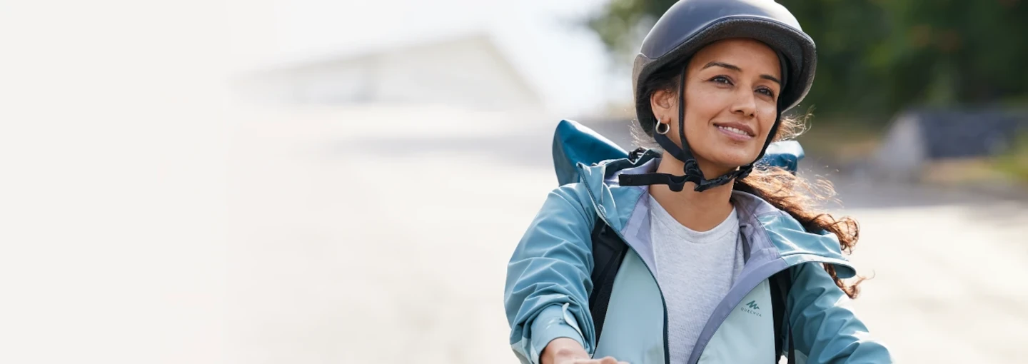 A woman riding a bike