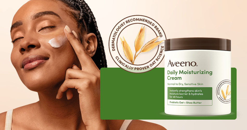 Woman smiling next to a jar of the Aveeno® Daily Moisturizing Cream.