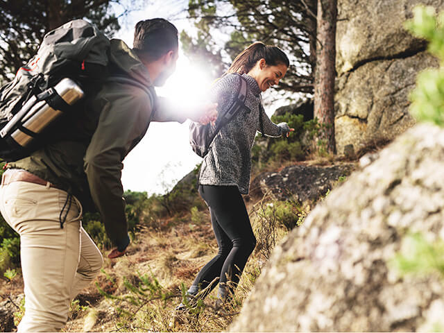 Young couple hikes outside