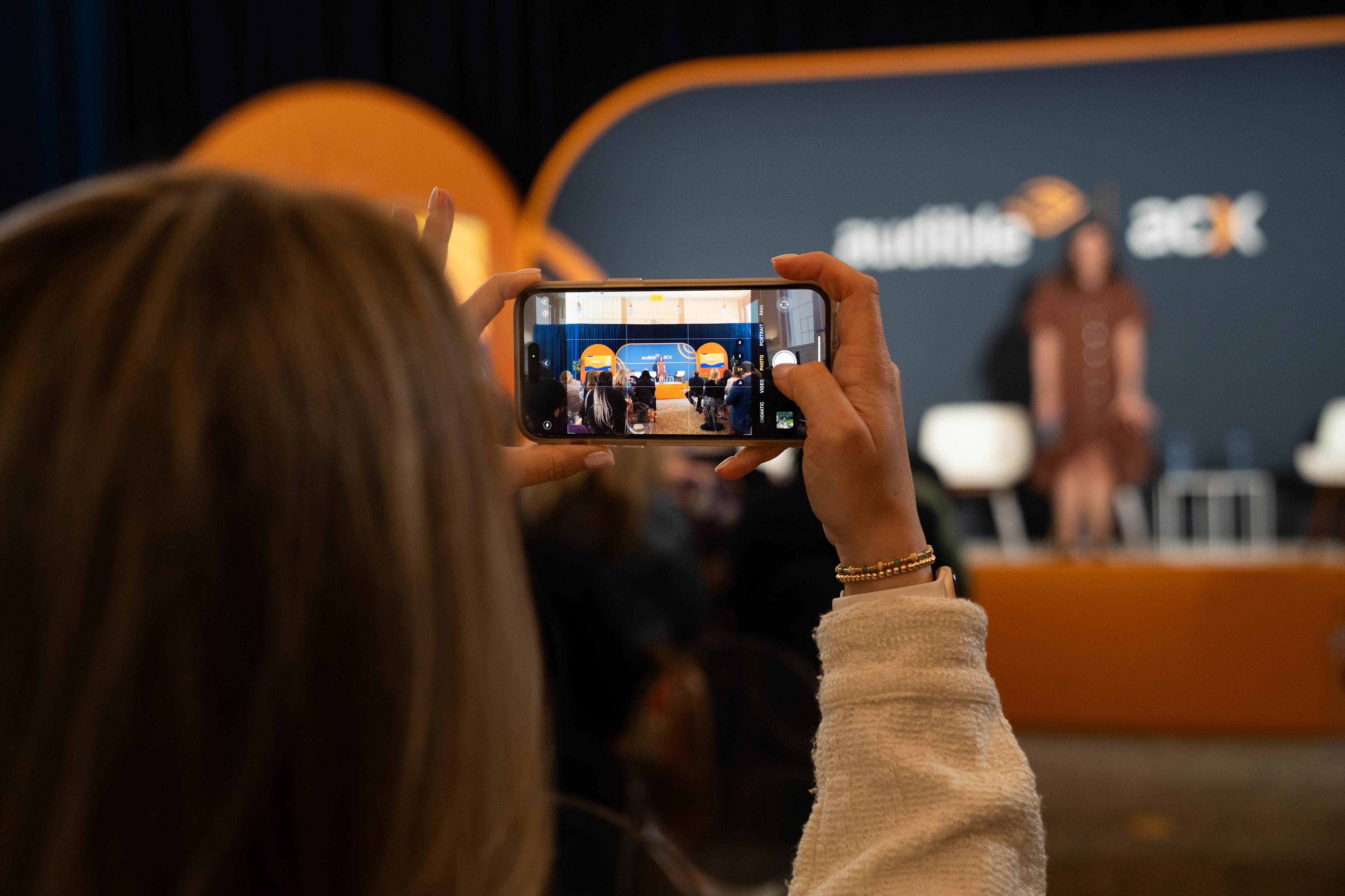 someone taking a pic of the ACX author summit 2025