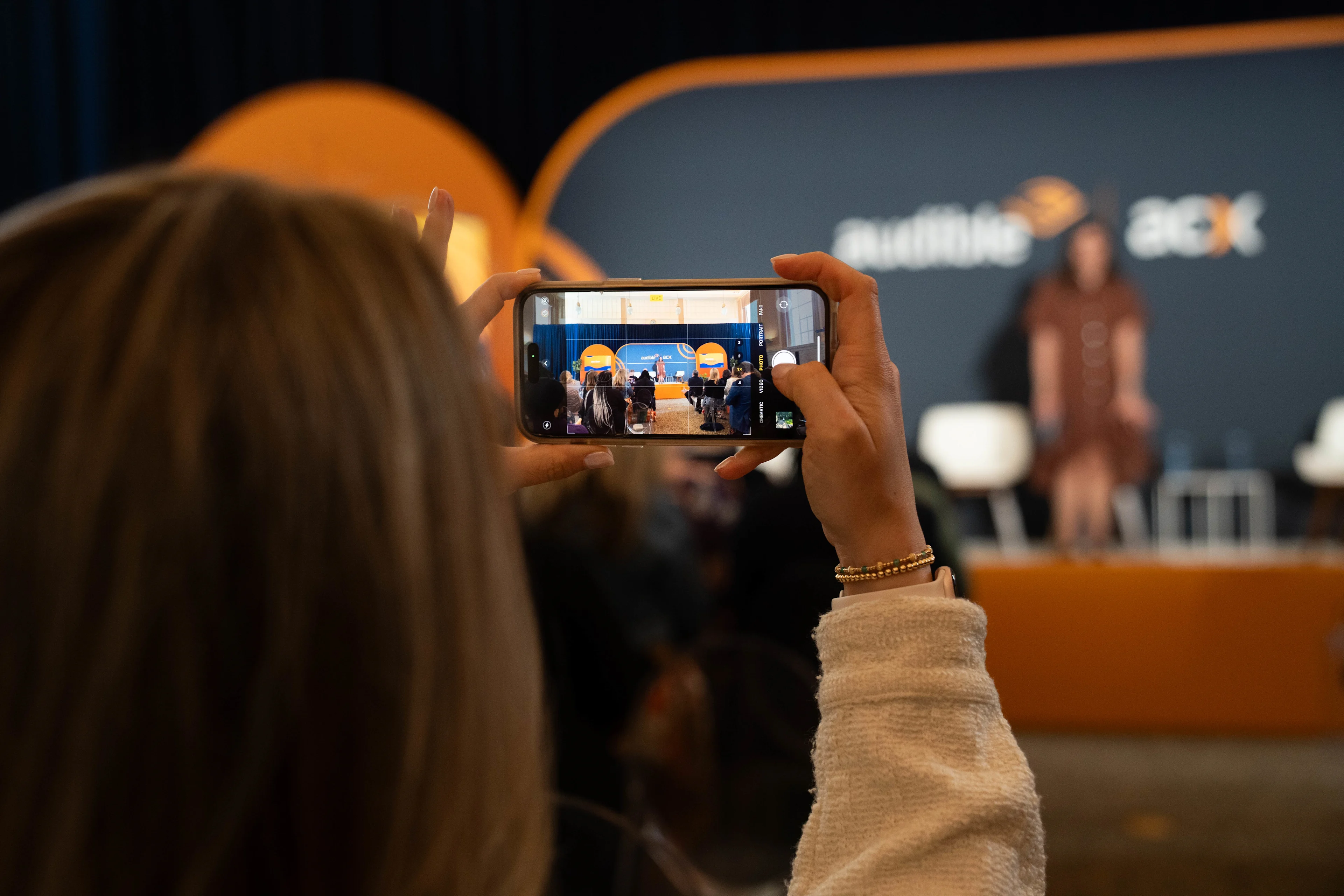 someone taking a pic of the ACX author summit 2025