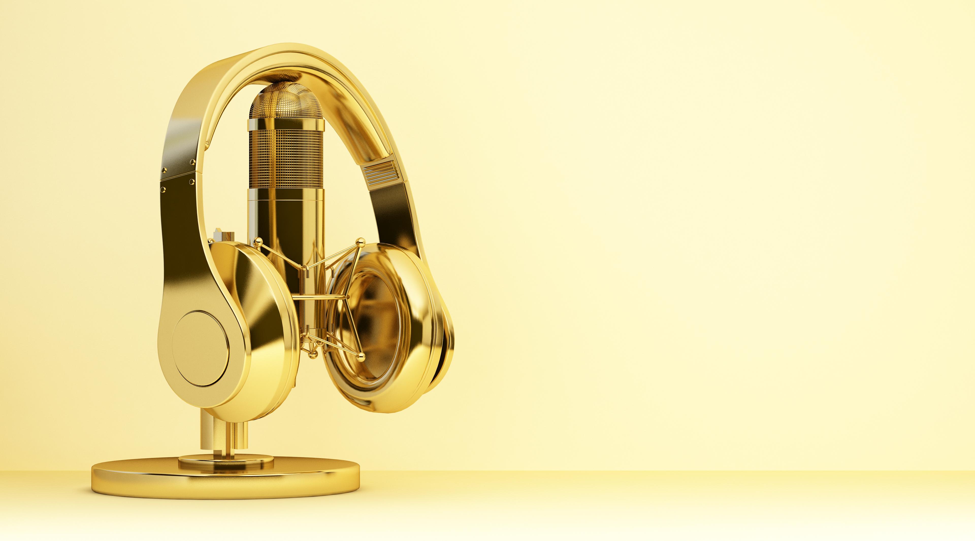 gold headphones & microphone; used for AAP relaunch