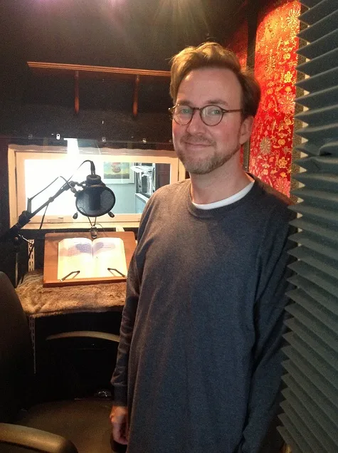 Peter A. Rohan in his booth