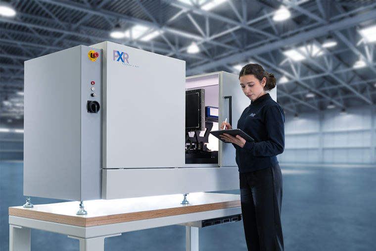 Woman operating an industrial ct scanning machine by ProCon X-Ray.