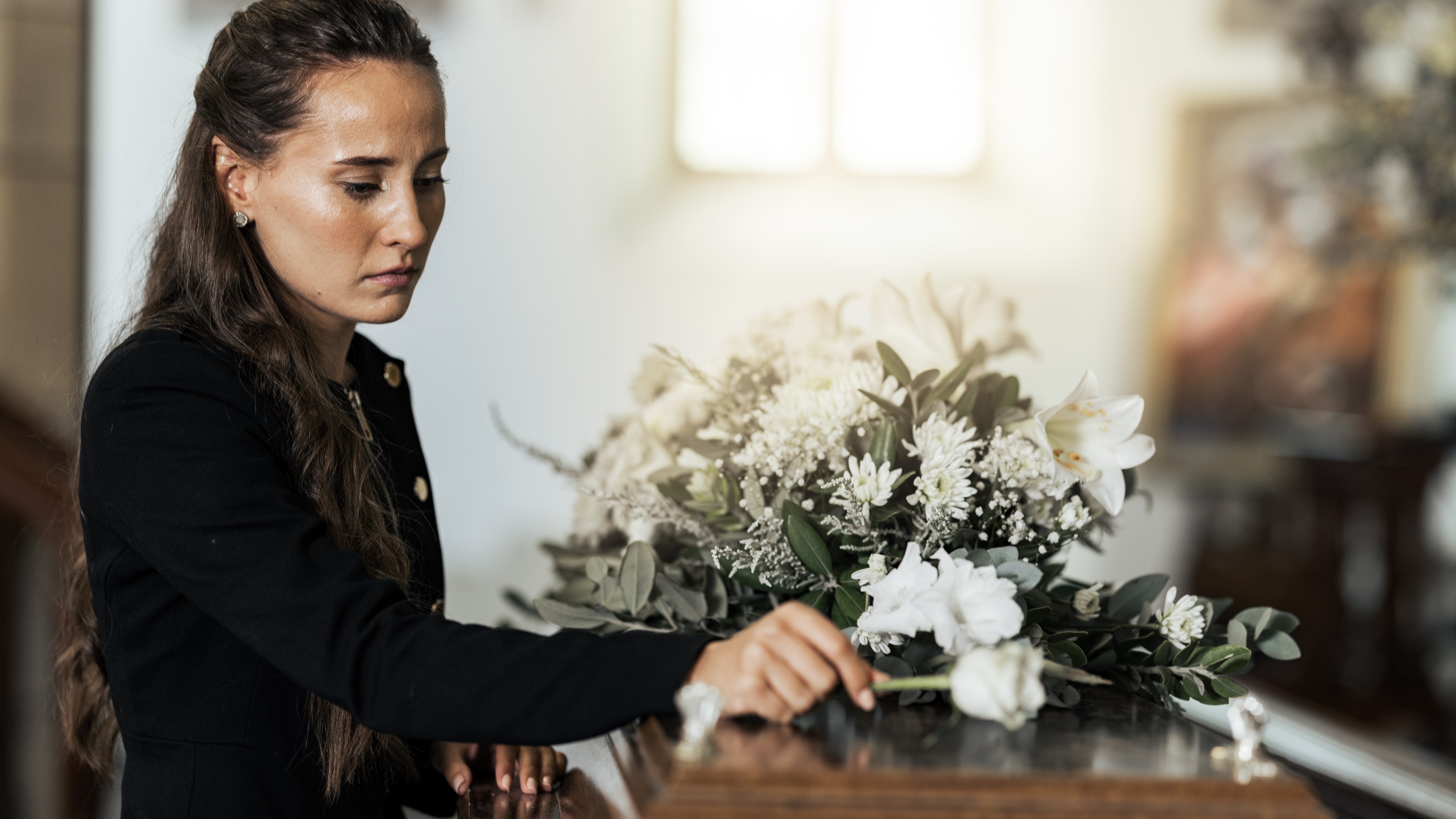 At Her Husband's Burial, A Bereft Wife Leans In For One Last Kiss And ...