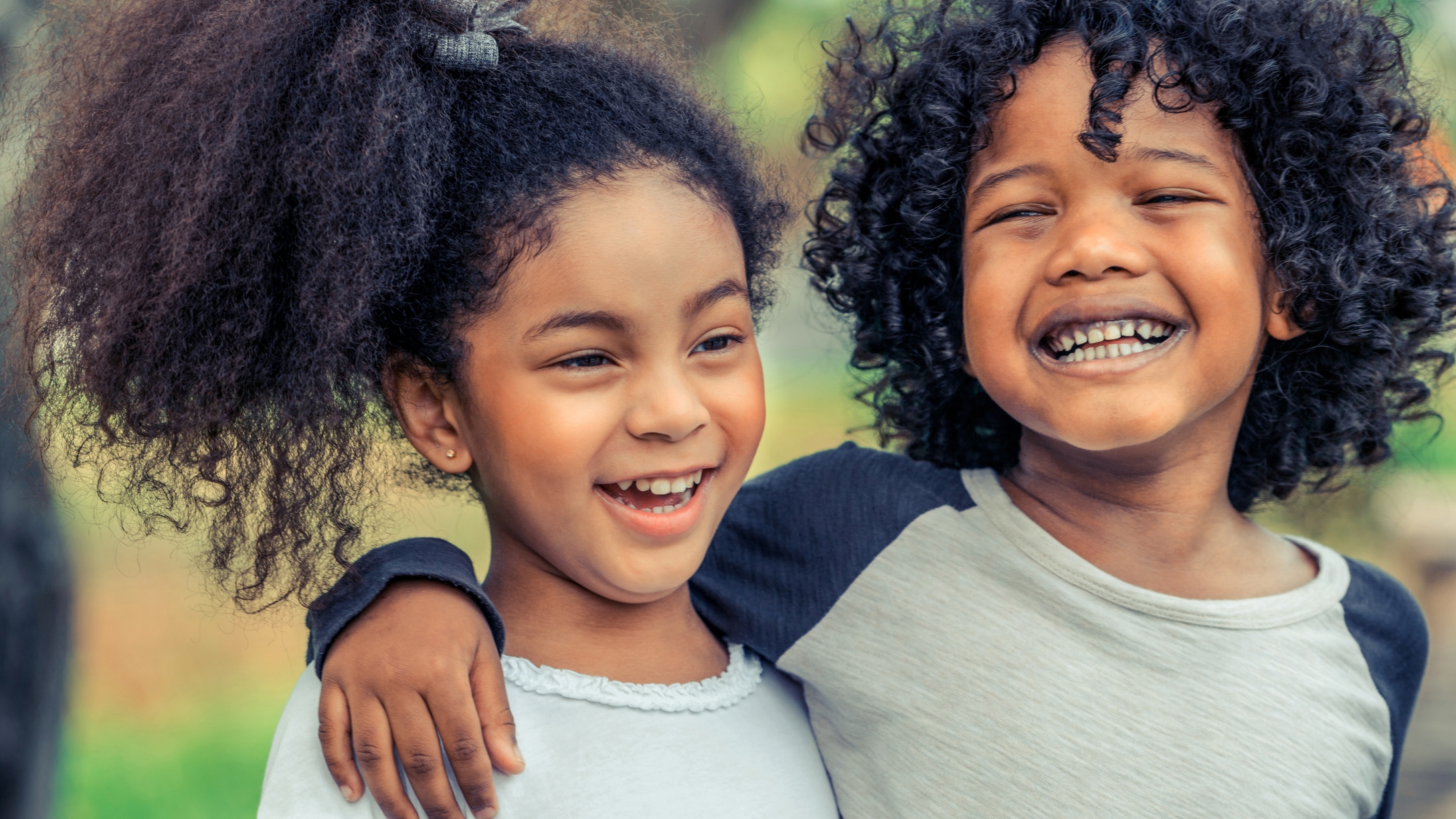 Cultivating A Positive Attitude Toward Curly And Coily Hair In Our Kids |  LittleThings.com