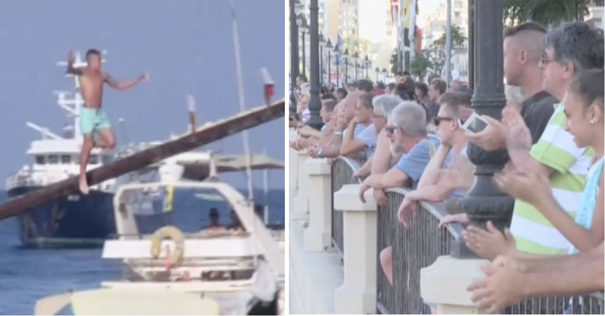 Huge Crowd Stares As Contestants Try Their Best To Run Up A Greasy Pole ...