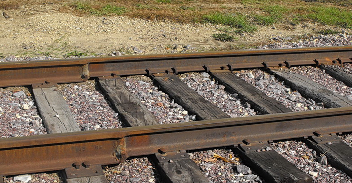 They Saw A Figure Tied To The Railroad Tracks. When They Got Closer