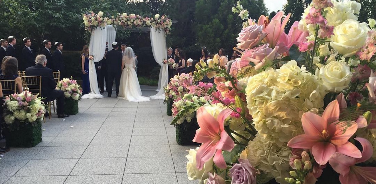 Wedding Guests Can't Stop Laughing When 'Flower Grandpa' Walks Down The Aisle