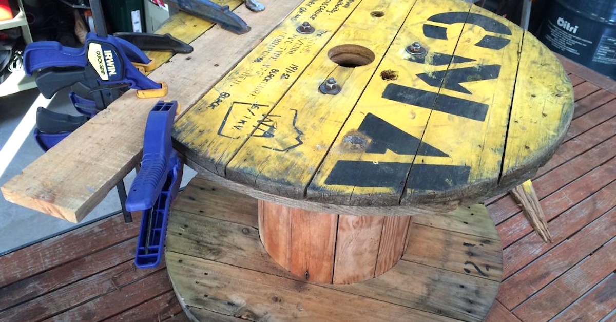 He Lugs Home An Old Cable Drum. When He Sets It Up In His Living Room ...