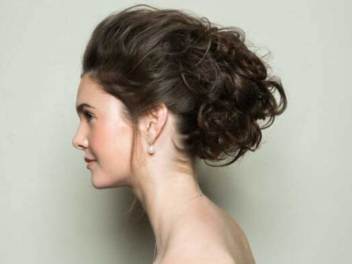 Image of Cinnamon roll bun hairstyle on frock
