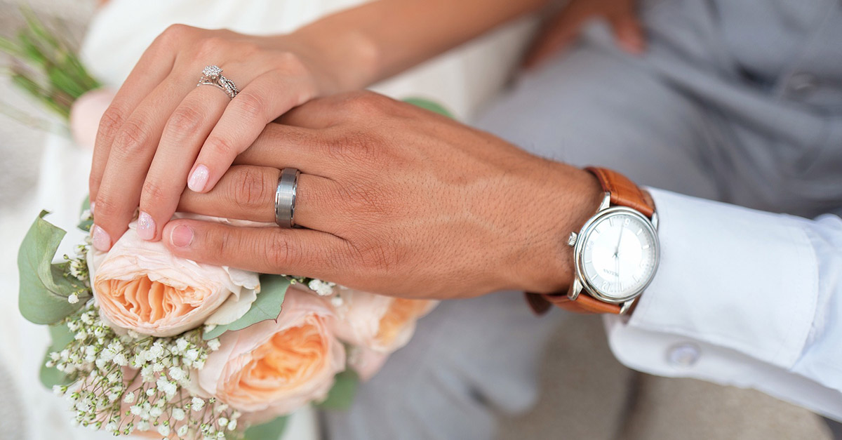 Wedding ring store place in hand