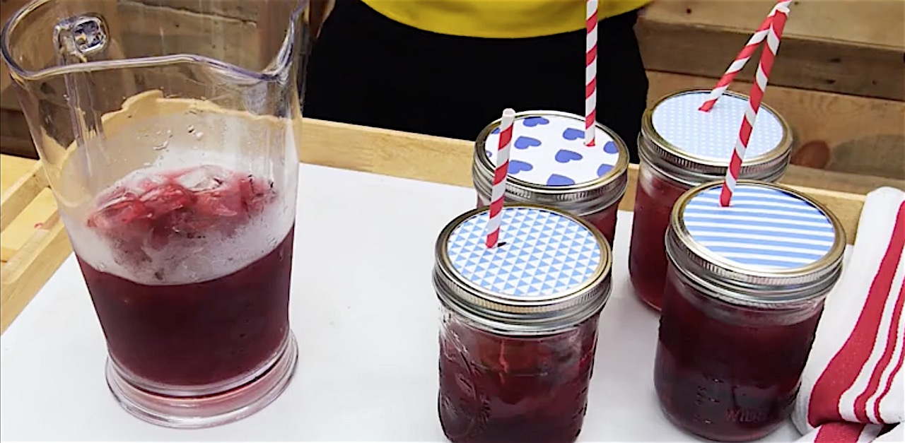 She Pours Hot Glue Into A Mason Jar Lid. What She Pops Inside?