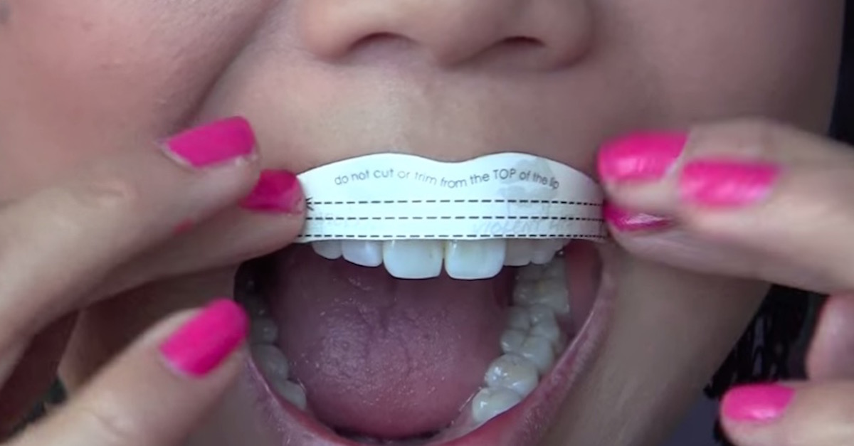 She Presses A Scrap Of Paper To Her Mouth Now Watch As She Slowly Peels It Back Littlethings Com