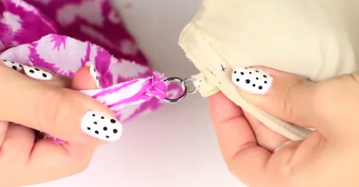 She Hooks A Pink Scarf To The Side Of Her Bra. What She Turns It In To?  This Is GENIUS!