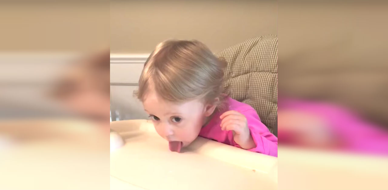 Toddler Enjoys Licking Her Water Up Like A Dog