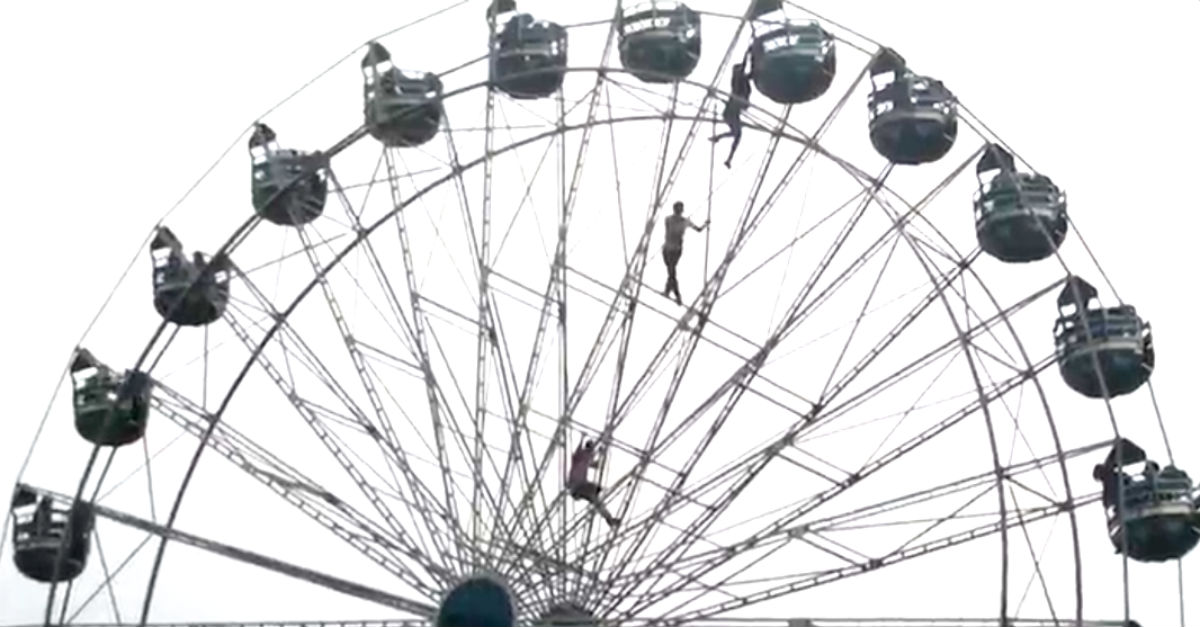 Girl Dangles From Top Of Ferris Wheel, Then 2 Men Climb Up ...