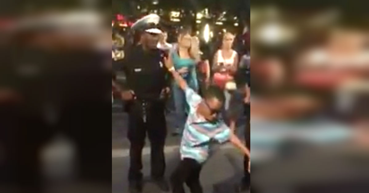 Young Boy Throws His Hand In An Officer's Face. The Cop's Reaction Is