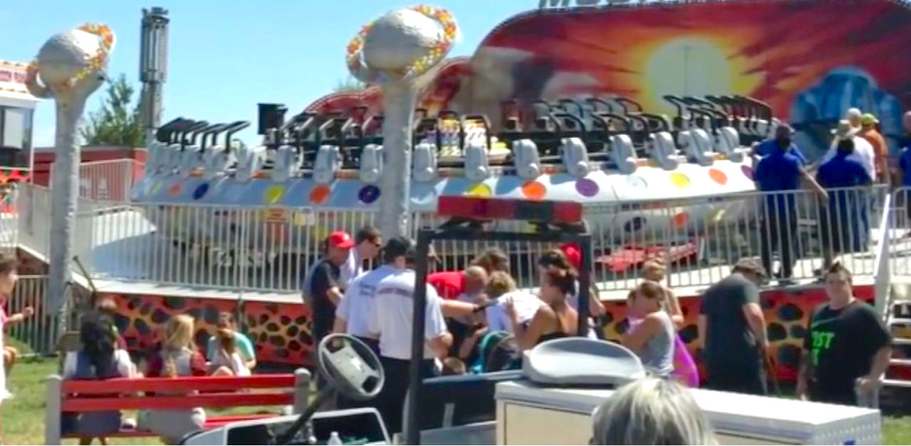 Teen Dangles From A Broken Carnival Ride After Safety Bar Opens In The ...