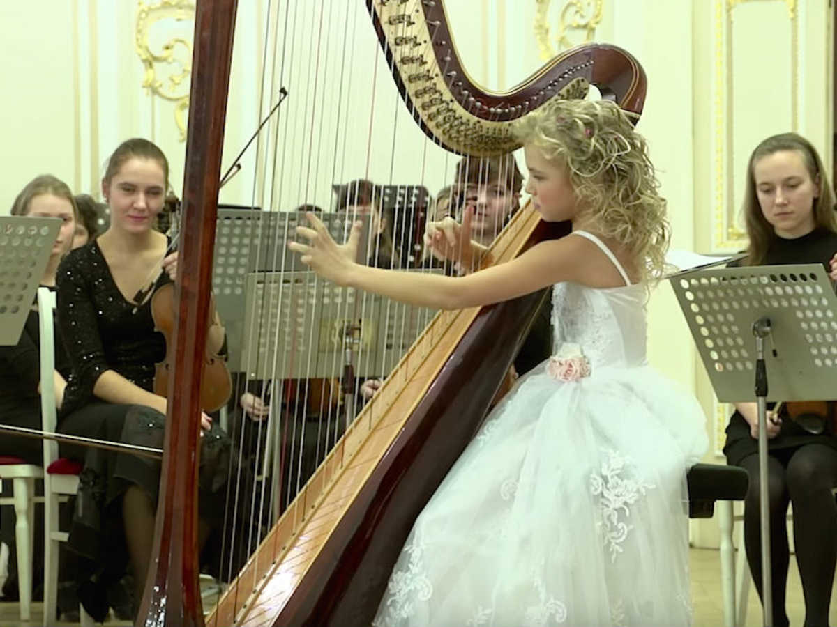 Tiny ''Angel'' Sits Perfectly Still. When The Music Starts, Millions Of People Are ASTOUNDED. | LittleThings.com