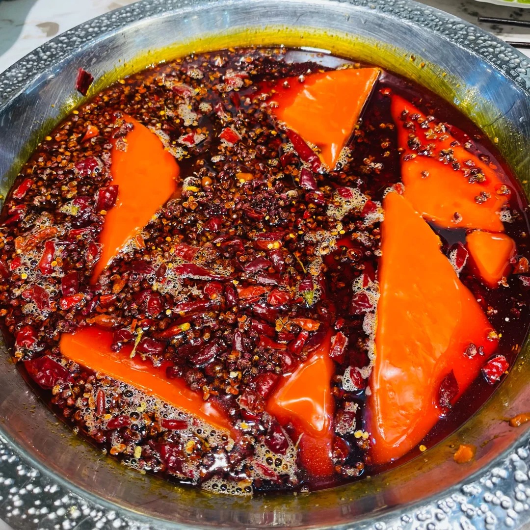 Red chili oil--a mixture of beef bone broth 