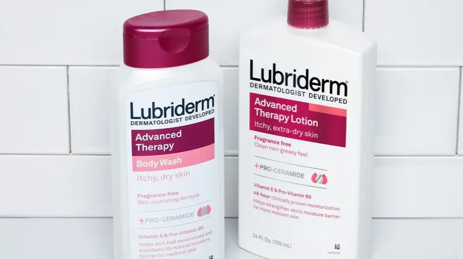 Lubriderm(R) Advanced Therapy products on dark pink background