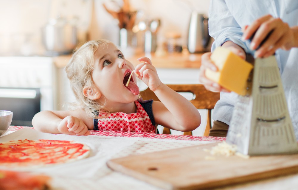 Kid eating cheese