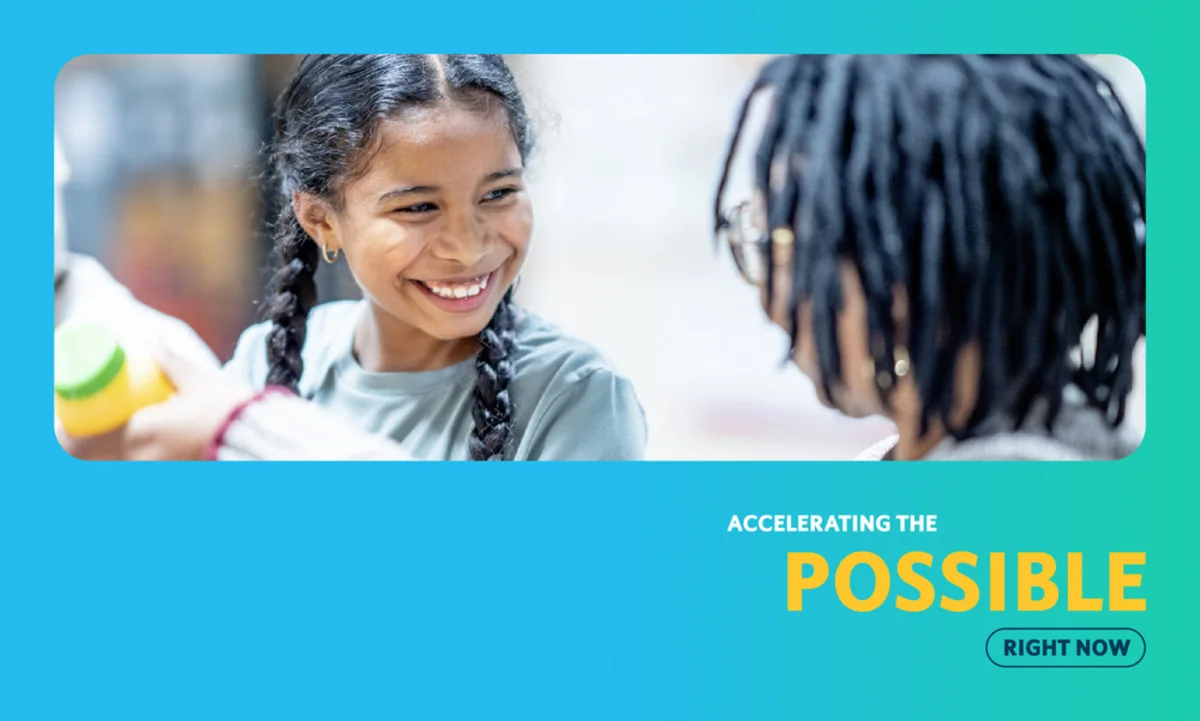 Smiling girl with braided hair in conversation
