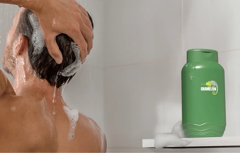 Man washing hair with Chameleon shampoo