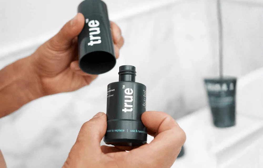 True deodorant being uncapped