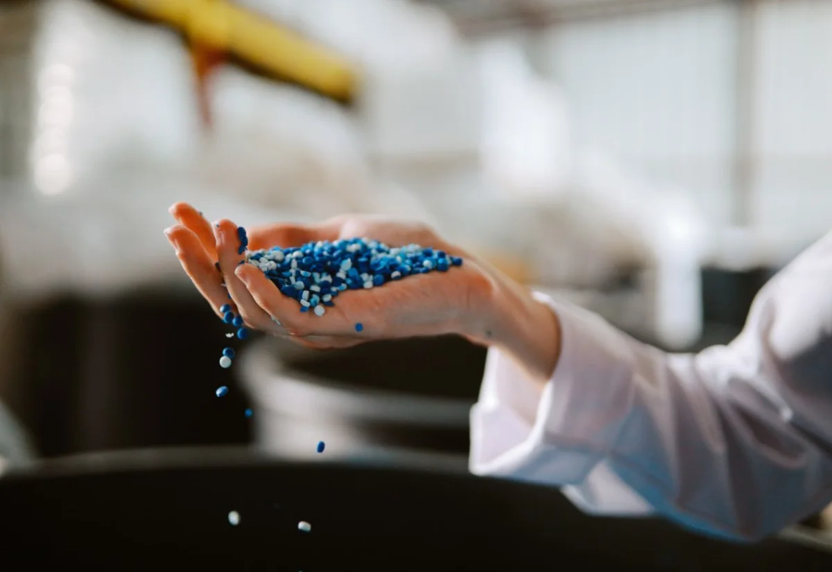 GettyImages-1335985296 female biodegradable pellets in hand